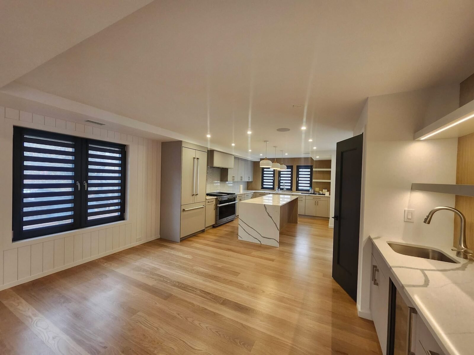 Repainted white walls and ceiling in an open-concept Stamford CT kitchen