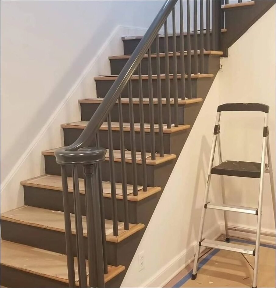 Staircase repainted with gray risers, spindles and handrail in a Trumbull CT home